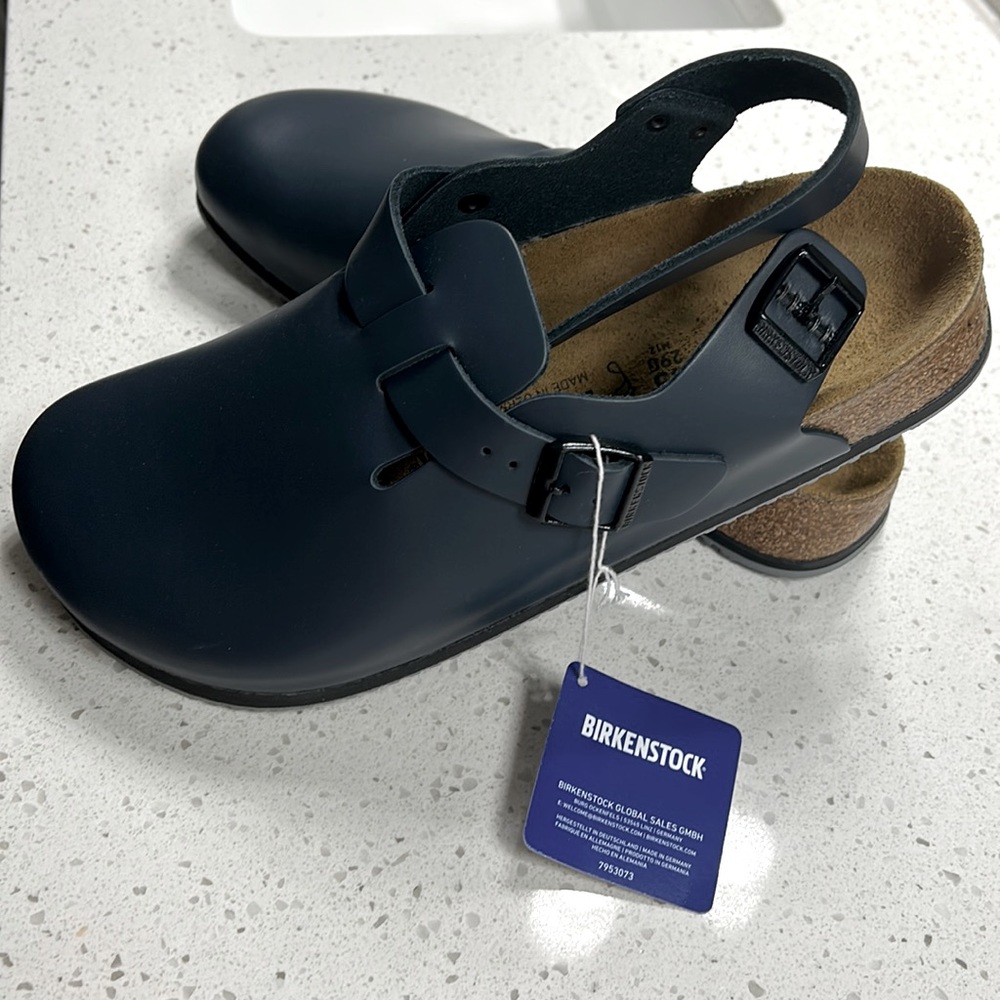 Brand new Men’s Birkenstock clogs, navy blue color. Size 12.